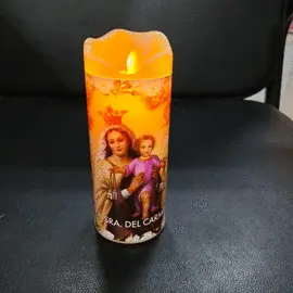 VELA VIRGEN DEL CARMEN A PILAS CON MECHA MOVIMIENTO.